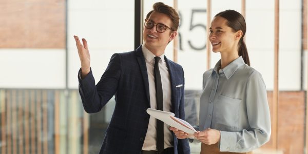 real estate agent showing commercial property